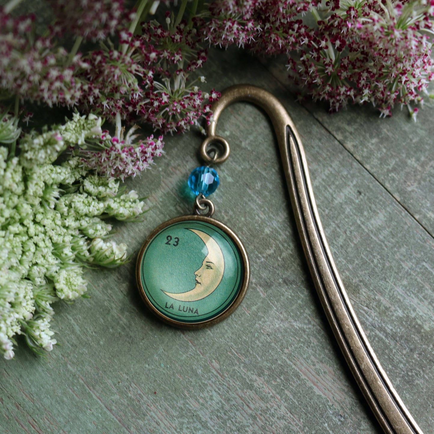 Loteria La Luna Crescent Moon Glass Cabochon Bronze Bookmark